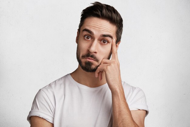 Young bearded man with white T-shirt