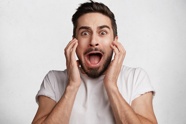 Young bearded man with white T-shirt