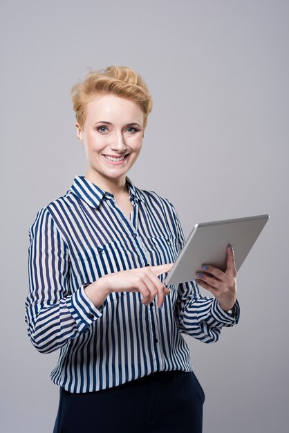 Young beautiful businesswoman posing isolated