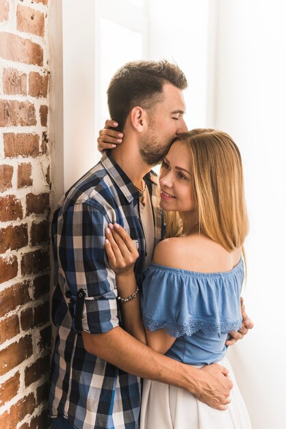 Young beautiful couple hugging each other