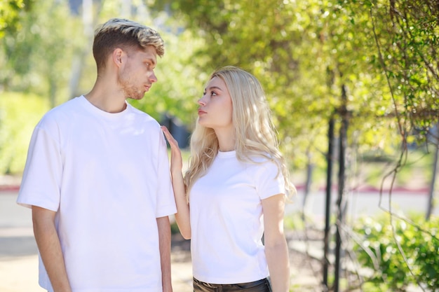 Free photo young beautiful couples standing on and looking at each others high quality photo