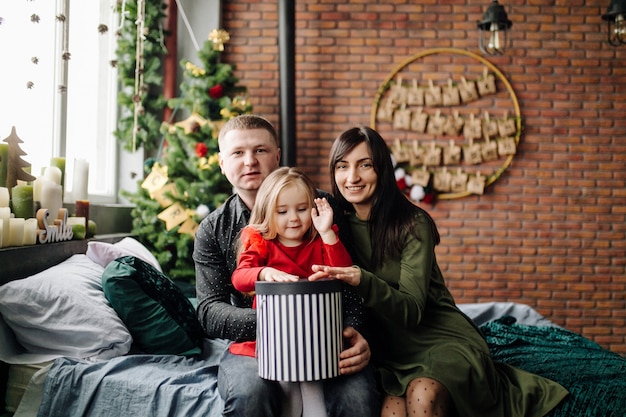 Young beautiful father and mother with baby