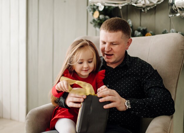 Young beautiful father with baby