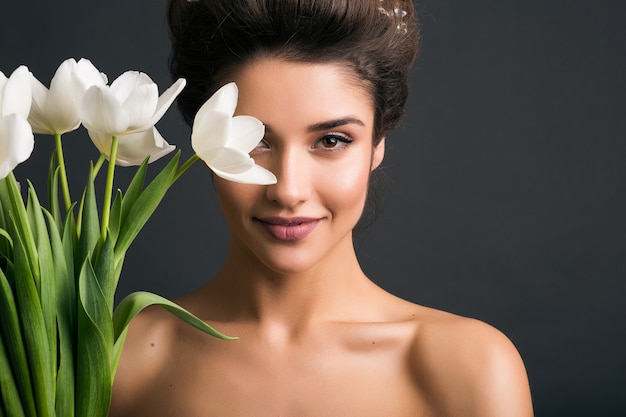 Young beautiful stylish woman in wedding dress