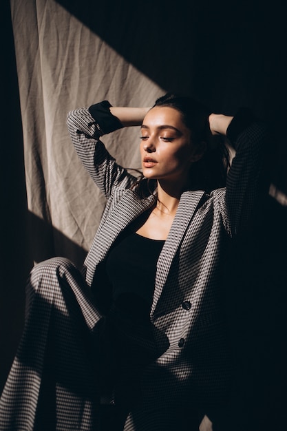 Young beautiful woman in a business suit