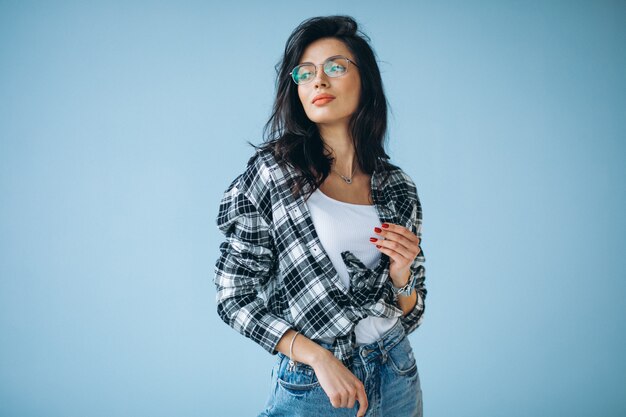 Young beautiful woman in casual outfit isolated in studio