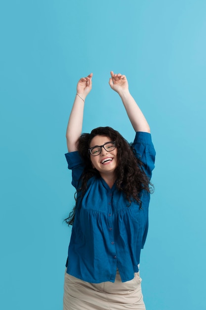 Young and beautiful woman celebrating life