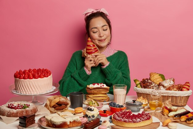 Young beautiful woman enjoying a wholesome dinner