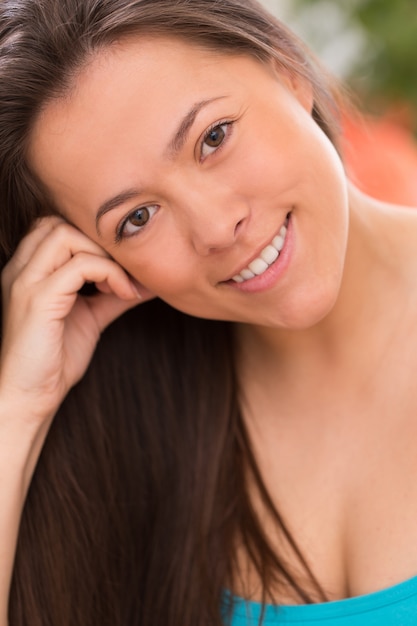 Young beautiful woman at home