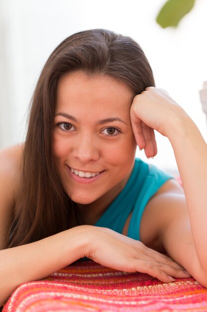 Young beautiful woman at home