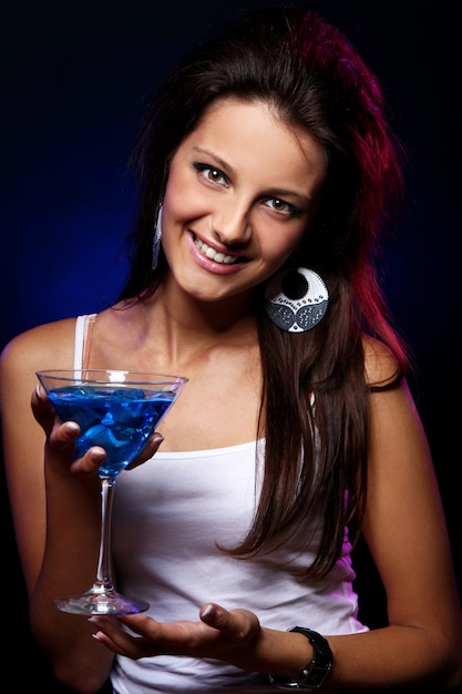 Free photo young and beautiful woman in the nightclub