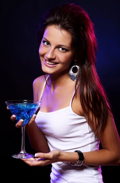 Young and beautiful woman in the nightclub