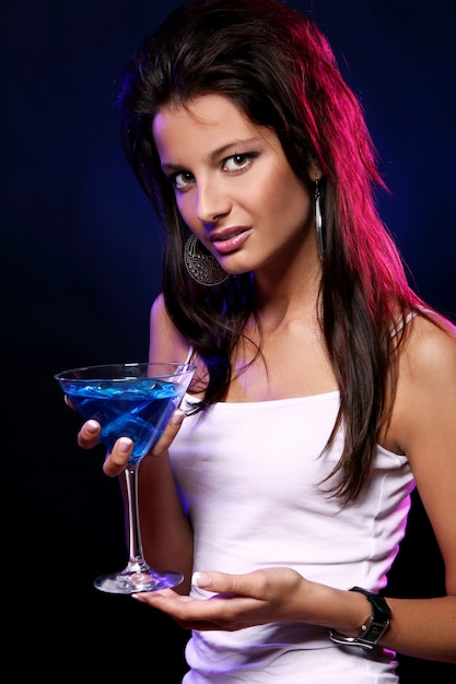 Young and beautiful woman in the nightclub