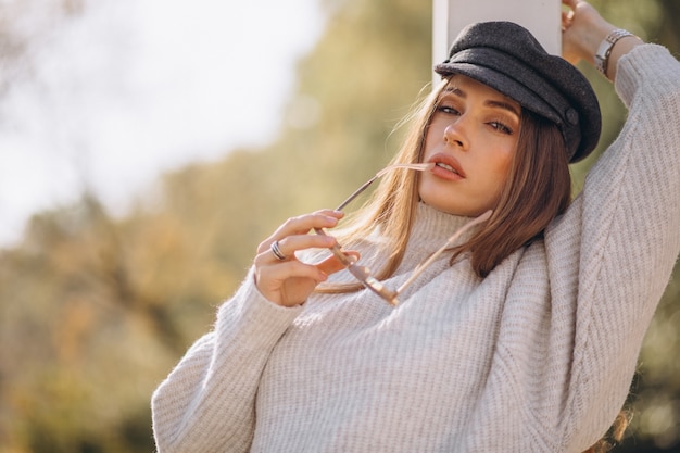 Young beautiful woman outdoors in park