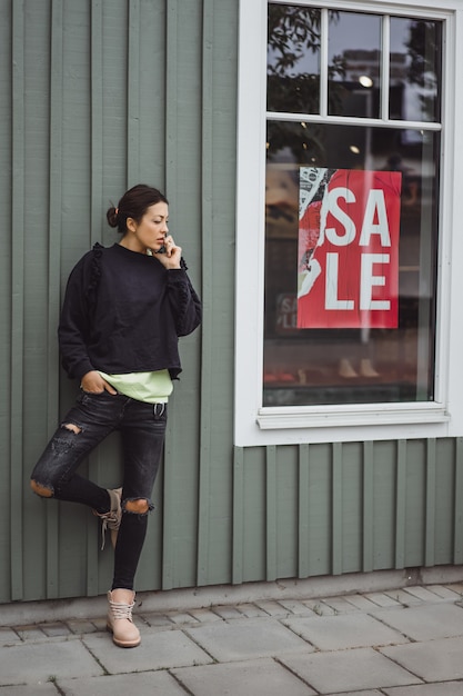 young beautiful woman talking on the smartphone.