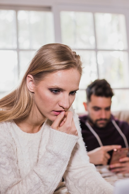 Young beautiful woman thinking with concentration