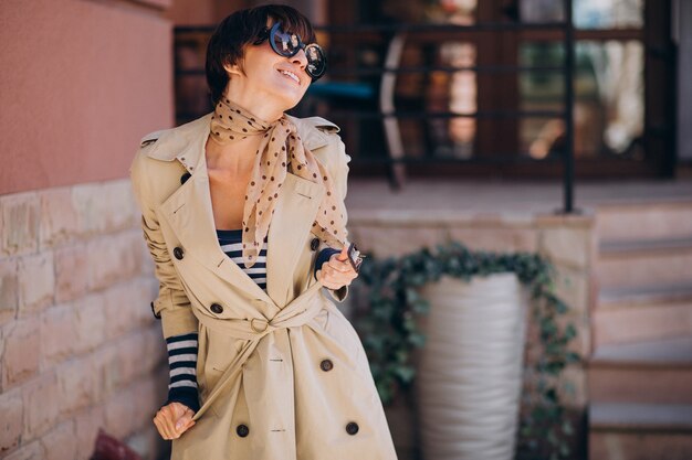 Young beautiful woman walking on a sunny day