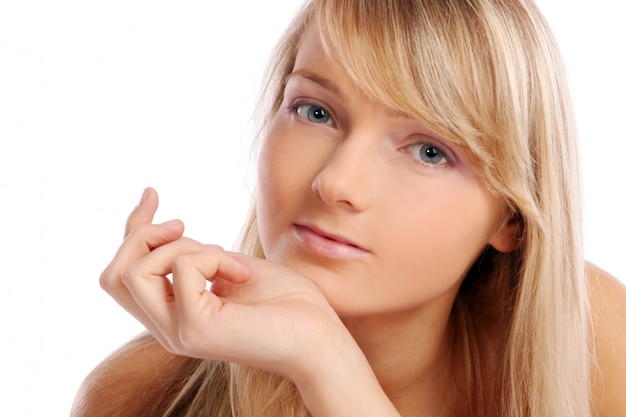 Young and beautiful woman on white