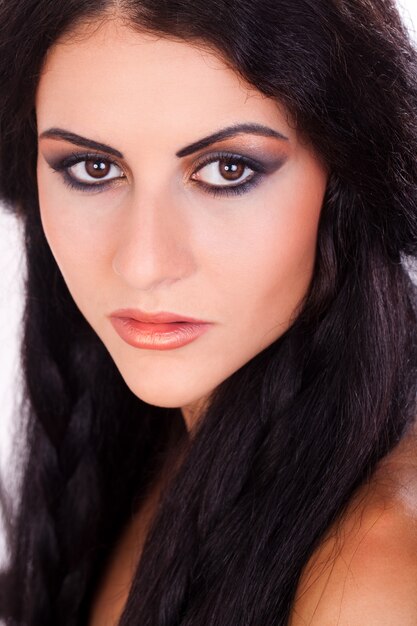 Young and beautiful woman with bright make up