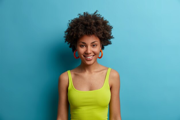 Young beautiful woman with curly hair isolated