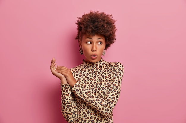 Free photo young beautiful woman with curly hair isolated