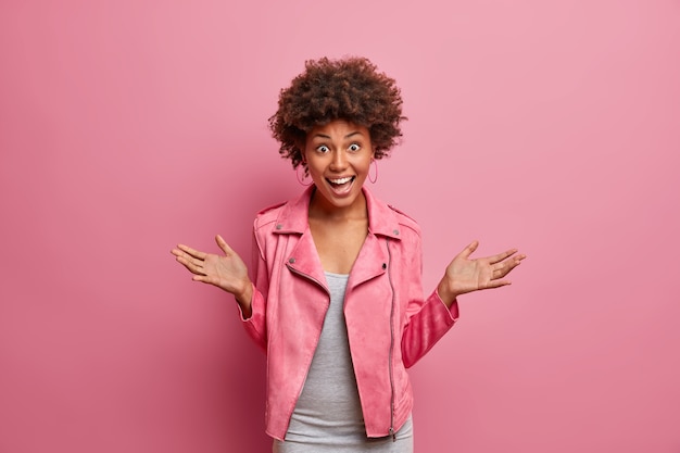 Free photo young beautiful woman with curly hair isolated