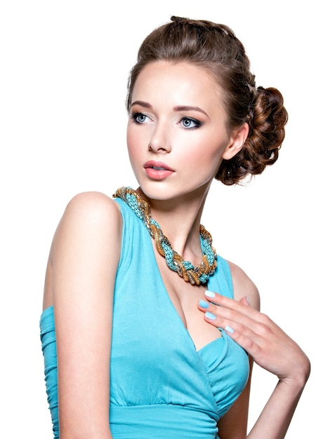 Young beautiful woman with jewelry.