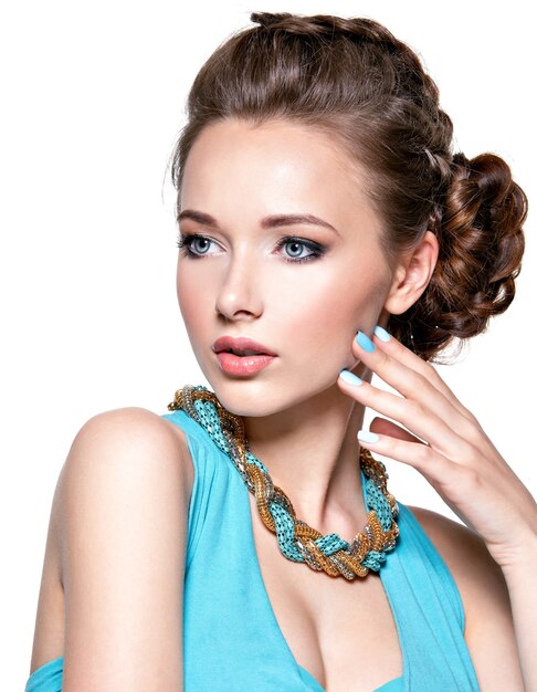 Young beautiful woman with jewelry.