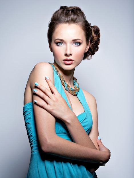 Young beautiful woman with jewelry.