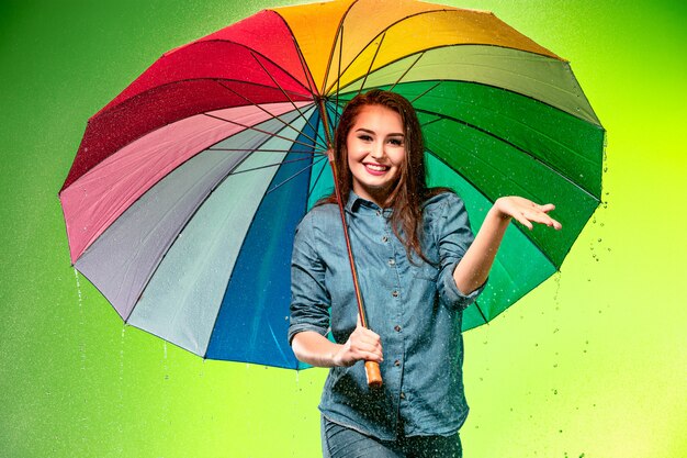 Young beautiful woman with an umbrella.