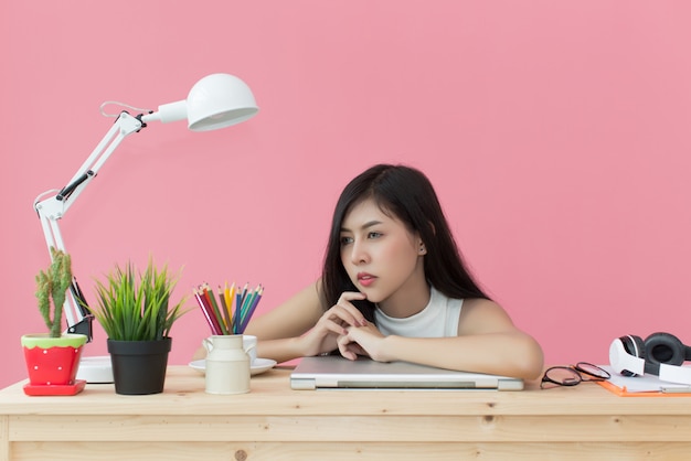 Young beautiful working at computer desk