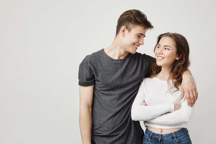 Free Photo young beautiful young couple in love hugging