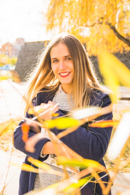 Young beauty model smiling and looking at camera