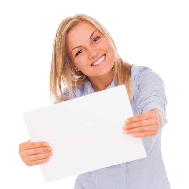 Young blond woman showing paper