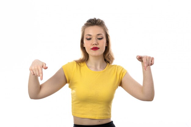 Young blond woman with yellow t-shirt