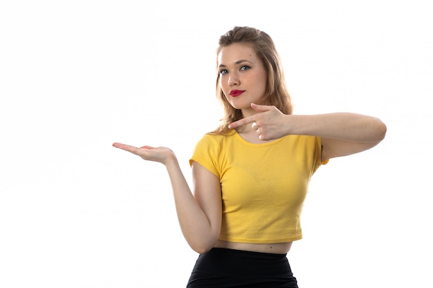 Young blond woman with yellow t-shirt