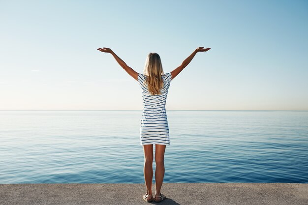 Young blonde woman at the beach