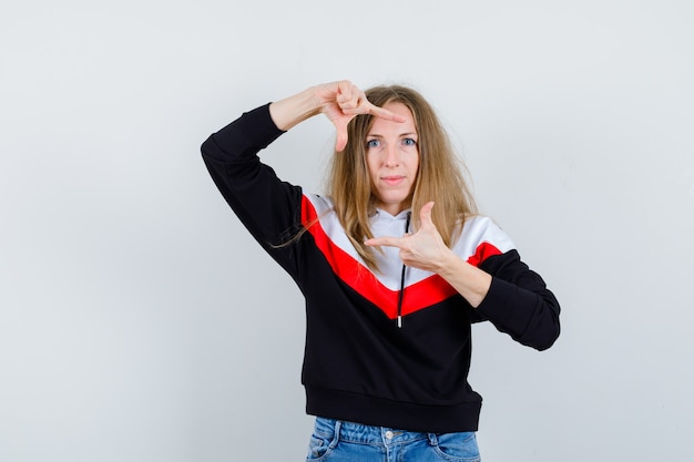 Free photo young blonde woman in a jacket and jeans