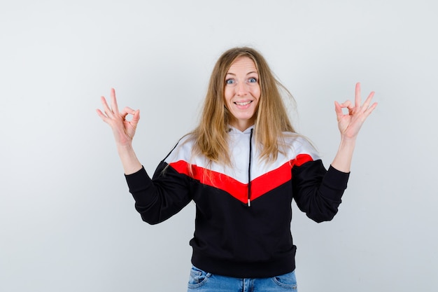 Free photo young blonde woman in a jacket and jeans