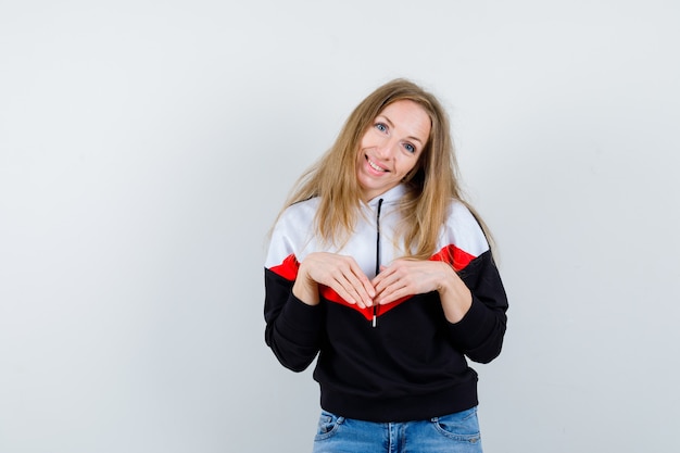 Young blonde woman in a jacket and jeans