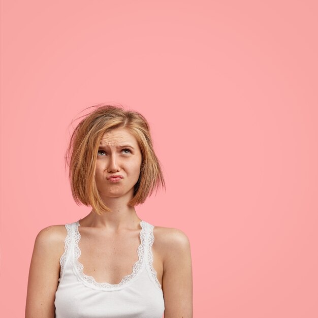 Young blonde woman with messy hair