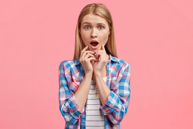 Young blonde woman with striped shirt