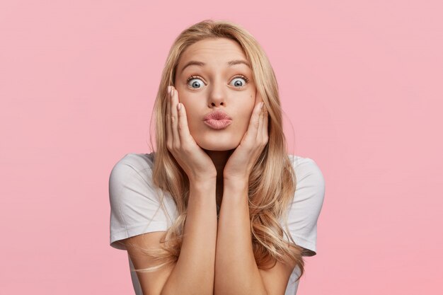 Young blonde woman with white T-shirt