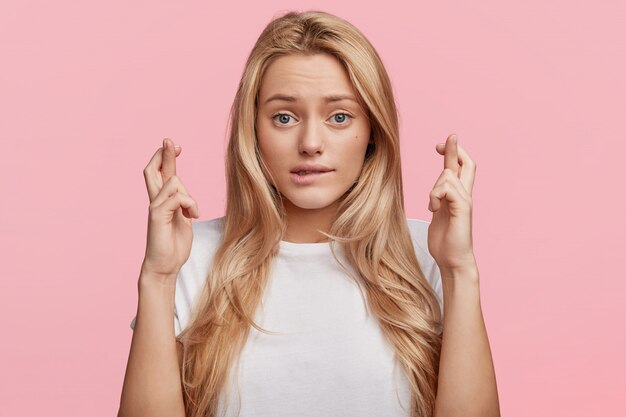 Young blonde woman with white T-shirt