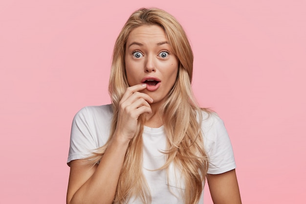 Young blonde woman with white T-shirt