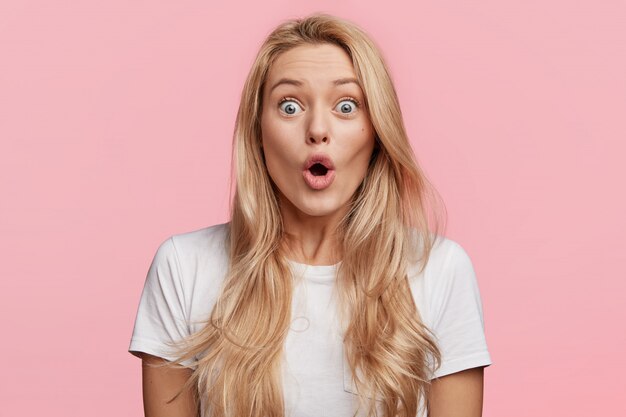 Young blonde woman with white T-shirt