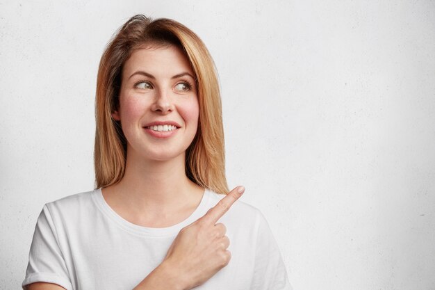 Young blonde woman with white T-shirt