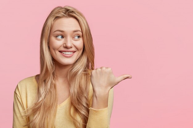 young blonde woman with yellow shirt