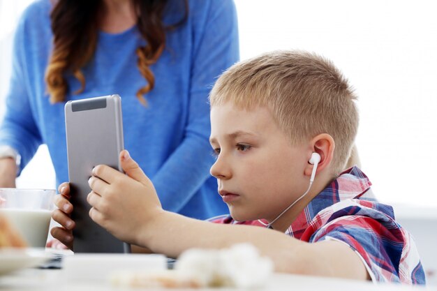 Young boy by the table