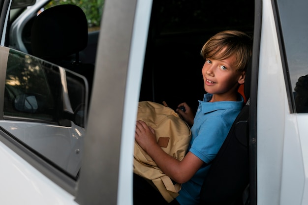 Young boy getting back to school